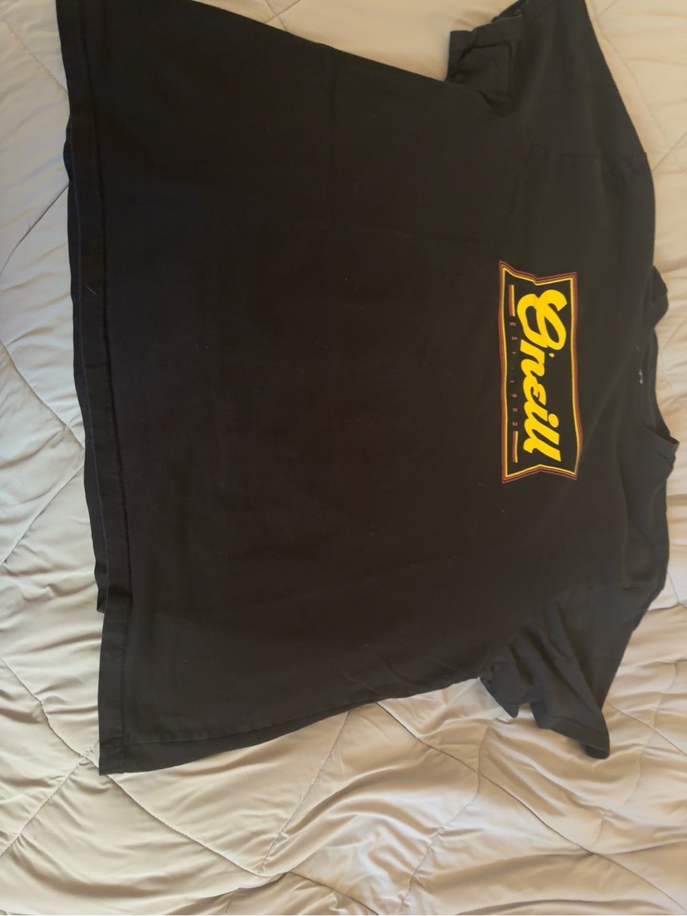 O'Neill Black Tee with Yellow and Red Chest Logo